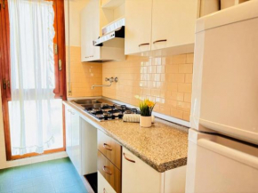 Modern flat in a building with garden Bibione
